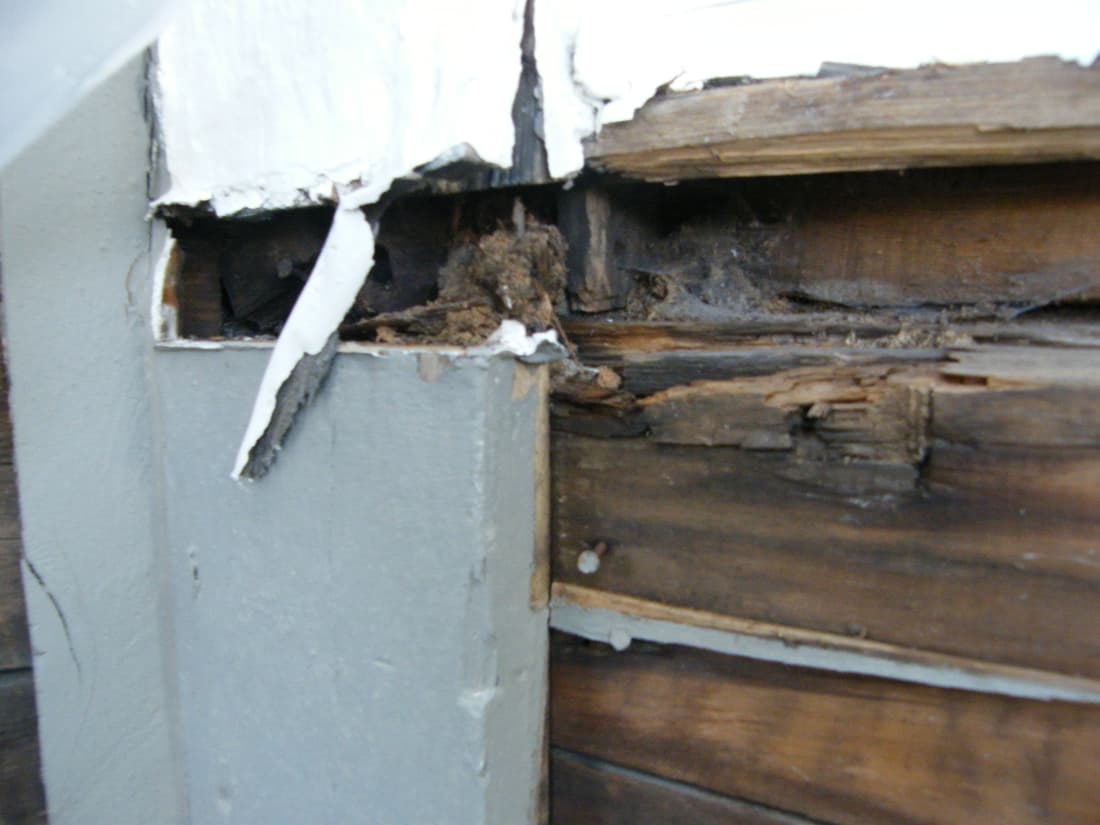 Rot in the framing at the bay, once the old trim came off.