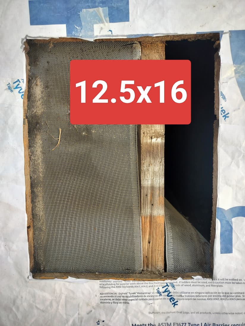 The gable vent opening, measured up for a new vent.
