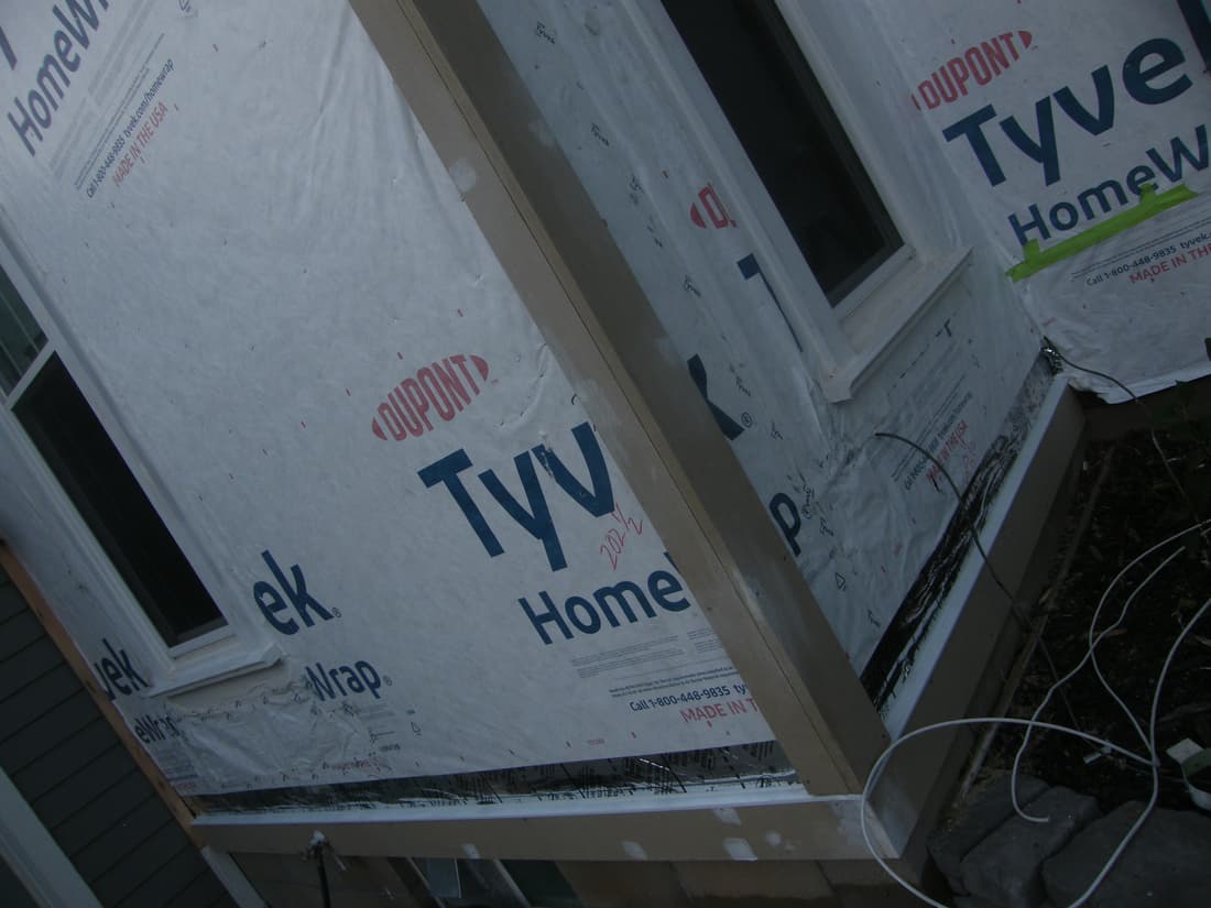 A trim band run along the wall under the eave.
