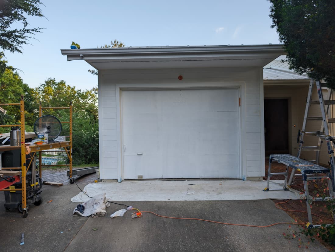 The garage wall and door primed. Everything took two coats of primer and two of paint.